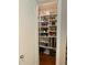 A well-stocked pantry with ample shelving to store all your cooking essentials at 130 Inwood Walk, Woodstock, GA 30188