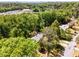 Lush, wooded property featuring a charming house nestled among mature trees in a serene setting at 2357 Burnt Creek Rd, Decatur, GA 30033