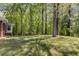 Secluded backyard features lush greenery and mature trees at 2357 Burnt Creek Rd, Decatur, GA 30033