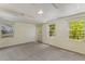 Basement featuring neutral walls and light gray carpet at 2357 Burnt Creek Rd, Decatur, GA 30033