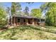 Charming brick home with well-maintained lawn and mature trees at 2357 Burnt Creek Rd, Decatur, GA 30033