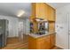 This bright kitchen features granite countertops, stainless steel appliances, and classic wooden cabinetry at 2357 Burnt Creek Rd, Decatur, GA 30033