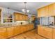 This kitchen offers wooden cabinetry, stainless steel appliances, granite countertops, and natural lighting at 2357 Burnt Creek Rd, Decatur, GA 30033