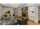 Cozy living room features a fireplace, built-in shelves, and comfortable seating at 2357 Burnt Creek Rd, Decatur, GA 30033