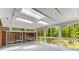 Bright sunroom with ample natural light offers serene views of the outdoors at 2357 Burnt Creek Rd, Decatur, GA 30033