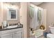 This bathroom includes a vanity with a granite countertop and a shower and tub combination at 25 Bridlewood Ct, Stockbridge, GA 30281