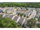A charming neighborhood aerial view showcasing lush green trees and well-maintained homes at 4422 Richmond Se Ct, Stone Mountain, GA 30083
