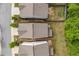 A birds-eye view showing the home, it's roofline, and compact, yet landscaped backyard at 4422 Richmond Se Ct, Stone Mountain, GA 30083