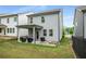 The backyard features a cozy covered patio and is adjacent to the neighboring home at 4422 Richmond Se Ct, Stone Mountain, GA 30083