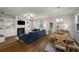 Bright living space with a fireplace, built-in shelving, and an adjacent dining area at 4422 Richmond Se Ct, Stone Mountain, GA 30083