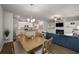 Modern open floor plan combining the kitchen, dining area, and comfortable living room at 4422 Richmond Se Ct, Stone Mountain, GA 30083