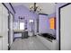 Unique bathroom featuring purple walls, a whirlpool tub, and double vanity at 7737 Bar Harbor Dr, Riverdale, GA 30296