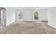 Bedroom with carpet flooring and windows at 7737 Bar Harbor Dr, Riverdale, GA 30296