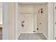 Empty laundry room features tile flooring and utility connections at 7737 Bar Harbor Dr, Riverdale, GA 30296