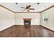 Open living area displaying hardwood floors, a fireplace, and recessed lighting at 7737 Bar Harbor Dr, Riverdale, GA 30296