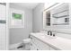 Stylist updated bathroom with white countertops, bright vanity, and a designer accent floor at 808 Casplan Sw St, Atlanta, GA 30310