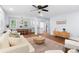 Bright living area with hardwood floors, modern furnishings, and easy access to the dining space at 808 Casplan Sw St, Atlanta, GA 30310