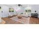 Spacious living room featuring hardwood floors, neutral furniture, and plenty of natural light at 808 Casplan Sw St, Atlanta, GA 30310