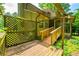 Wooden deck with lattice surround offers an extension of outdoor living space at 1131 Bailing Dr, Lawrenceville, GA 30043