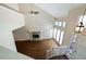 Bright living room with vaulted ceiling, stone fireplace, and hardwood flooring at 1131 Bailing Dr, Lawrenceville, GA 30043
