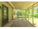 Relax on this screened in porch with views of the lush backyard at 1131 Bailing Dr, Lawrenceville, GA 30043