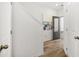Bright entryway with beautiful flooring and art piece near the front door and stairway at 2815 Habibi Ct, Buford, GA 30519