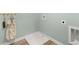 Practical laundry area with a utility sink and storage solutions at 2815 Habibi Ct, Buford, GA 30519