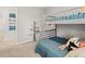 Cozy ' bedroom featuring bunk beds, a tree shelf, and a colorful art piece enhancing the playful atmosphere at 4962 Jatoba Rd, Acworth, GA 30101