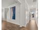Bright foyer with hardwood floors, neutral walls, and modern decor at 4962 Jatoba Rd, Acworth, GA 30101