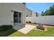 Inviting backyard featuring a paved patio and a modern fire pit, perfect for relaxing and entertaining outdoors at 5465 Mountain Top Pl, Cumming, GA 30041