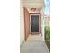 Inviting front door entrance with brick accents and stylish overhead lighting at 5465 Mountain Top Pl, Cumming, GA 30041