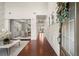 Inviting foyer with hardwood floors, high ceilings, and an open view into the dining and living spaces at 5760 Palmtree Pass, Cumming, GA 30040
