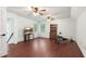 Spacious bonus room with hardwood floors, ceiling fans and ample lighting at 1440 Sandford Sw Trl, Lilburn, GA 30047