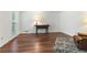 Minimalist living room with hardwood floors and stylish decor at 1440 Sandford Sw Trl, Lilburn, GA 30047