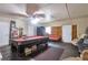 Basement game room featuring pool table and lounging area at 2004 Poplar Falls Rd, Lithonia, GA 30058