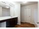 Bathroom featuring wood-look flooring, vanity, and shower with tub at 2352 Allman Dr, Jonesboro, GA 30236