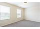 Bedroom featuring two windows offering plenty of natural light at 2352 Allman Dr, Jonesboro, GA 30236