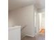 Bright hallway with carpet flooring leading to bathroom and additional rooms at 2352 Allman Dr, Jonesboro, GA 30236