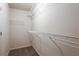 Walk-in closet equipped with shelving for storage and organization at 2352 Allman Dr, Jonesboro, GA 30236