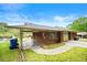 Brick house with paved area and covered carport at 3050 Rebecca Sw Dr, Atlanta, GA 30311