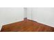 Bedroom displaying hardwood floors and a white-walled design at 3050 Rebecca Sw Dr, Atlanta, GA 30311