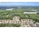 A home is in the distance near the Gwinnett County Public Library and Shilo Schools at 3178 Arbor Oaks Way, Snellville, GA 30039