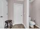 Neutral bathroom featuring a stool next to the toilet room at 3178 Arbor Oaks Way, Snellville, GA 30039