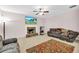 Cozy living room with fireplace and comfortable seating area at 3178 Arbor Oaks Way, Snellville, GA 30039