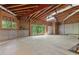 Unfinished basement area with natural light, offering potential for future expansion at 7830 Kings Point Dr, Cumming, GA 30041