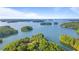 Expansive lake view featuring lush islands and serene waters, perfect for recreation at 7830 Kings Point Dr, Cumming, GA 30041