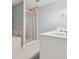 Bright bathroom featuring double sinks, a soaking tub, and a glass-enclosed shower at 1236 Brickton Nw Dr, Atlanta, GA 30318
