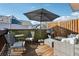 Private deck area with comfortable outdoor seating and shade umbrella at 1236 Brickton Nw Dr, Atlanta, GA 30318
