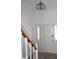 Bright entryway featuring paneled doors, natural light, and a stylish overhead light fixture at 1457 Stoneleigh Cir, Stone Mountain, GA 30088
