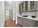 Butler's pantry with ample storage space, countertop, and subway tile backsplash at 1827 Shaker Falls Ln, Lawrenceville, GA 30045